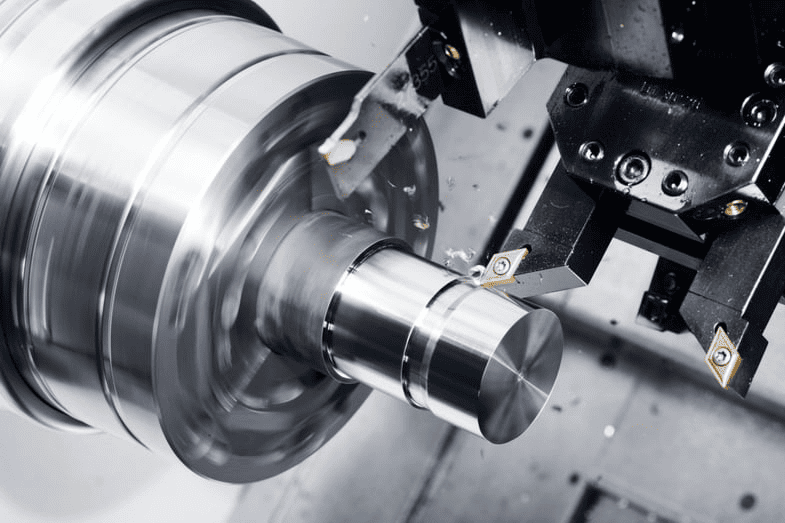CNC machine milling a metal part
