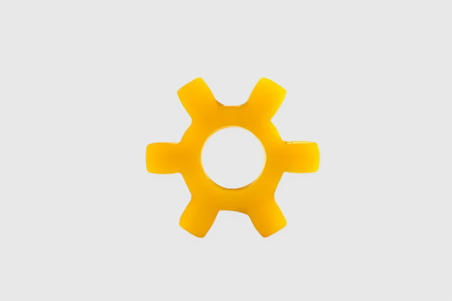 Yellow toy gear on plain background