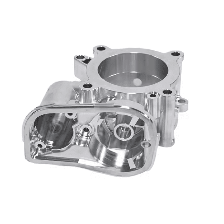 Polished metal engine component with cylindrical openings.