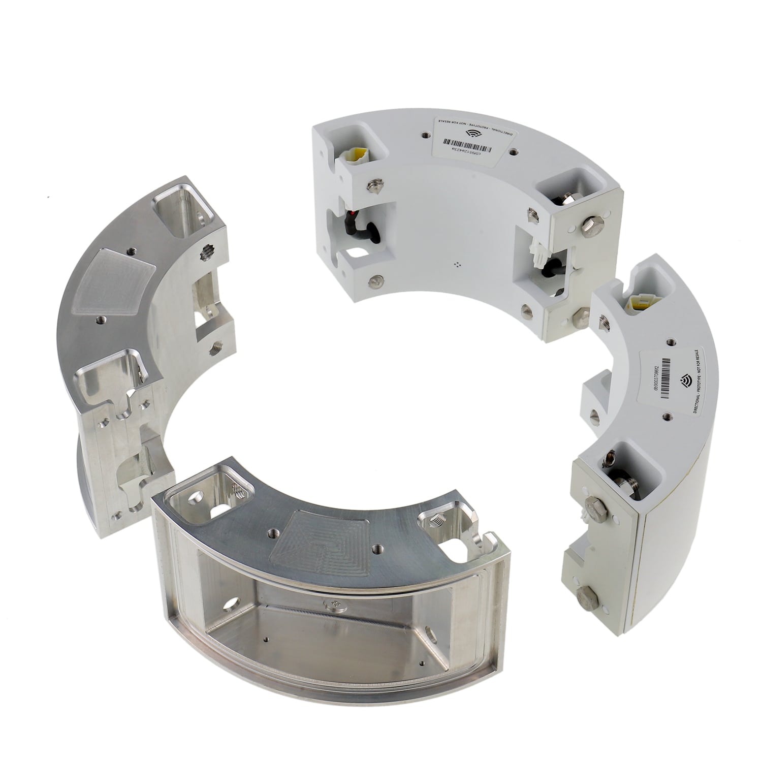 Circular metal parts with screws and connectors.