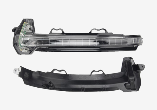 Car headlight components on white background