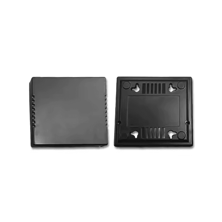 Two black plastic enclosures, top and bottom view