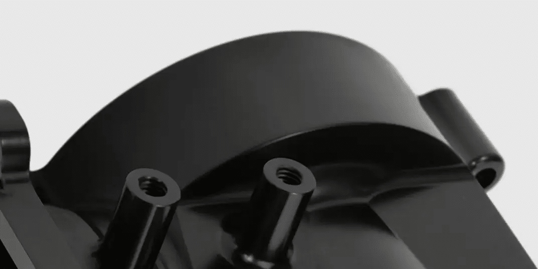 Close-up of black industrial metal component