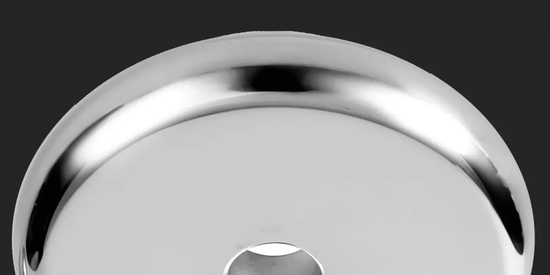 Close-up of a shiny metal round object