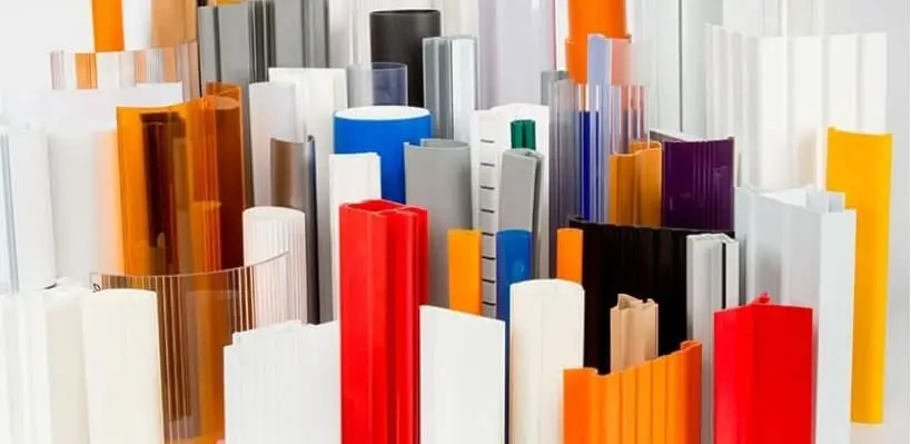 Various colored acrylic and plastic sheets displayed upright.