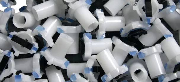 White plastic rollers with blue tips
