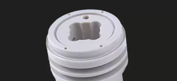 Close-up of white threaded plastic component