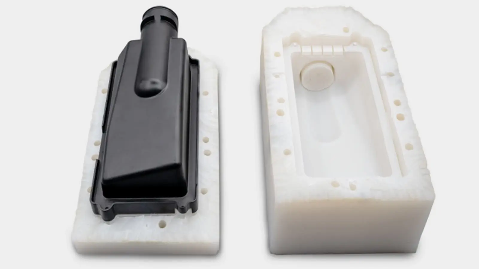 Injection mold with black component insert