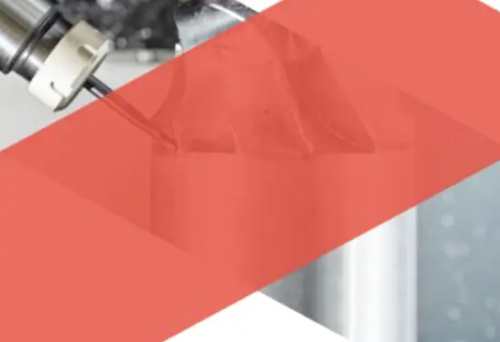 CNC milling machine cutting metal.