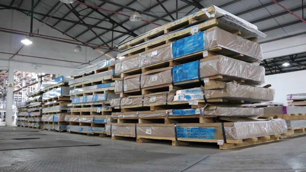 Stacked pallets in a warehouse.