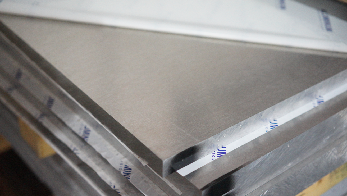 Stacked aluminum sheets with protective film