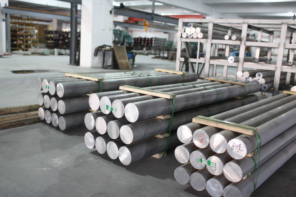 Stacked metal rods in a warehouse