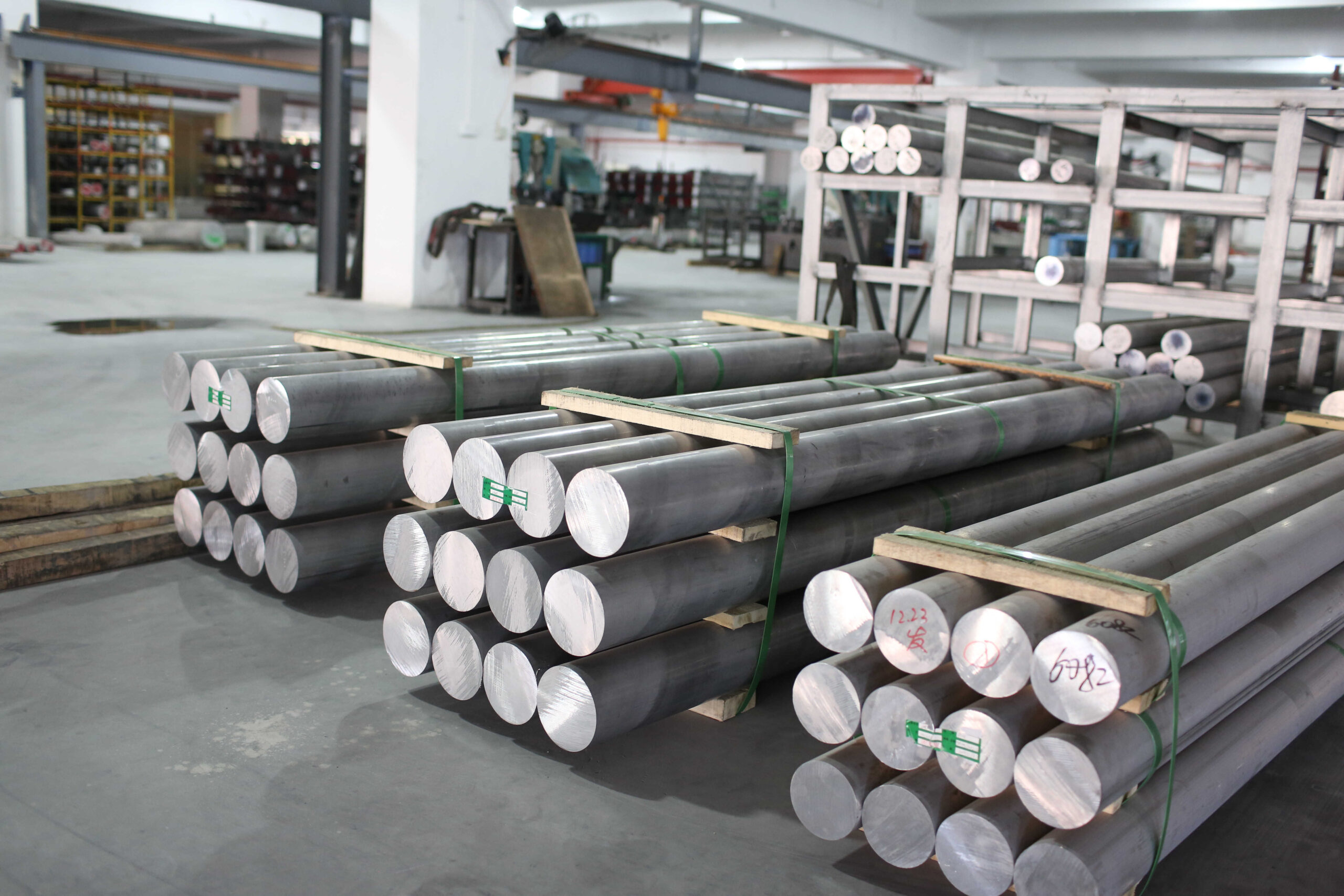 Stacked metal rods in a warehouse