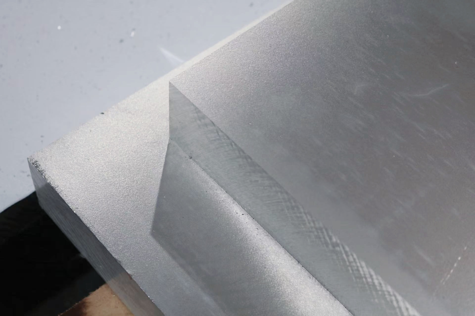 Close-up of metal block with smooth cut surface.
