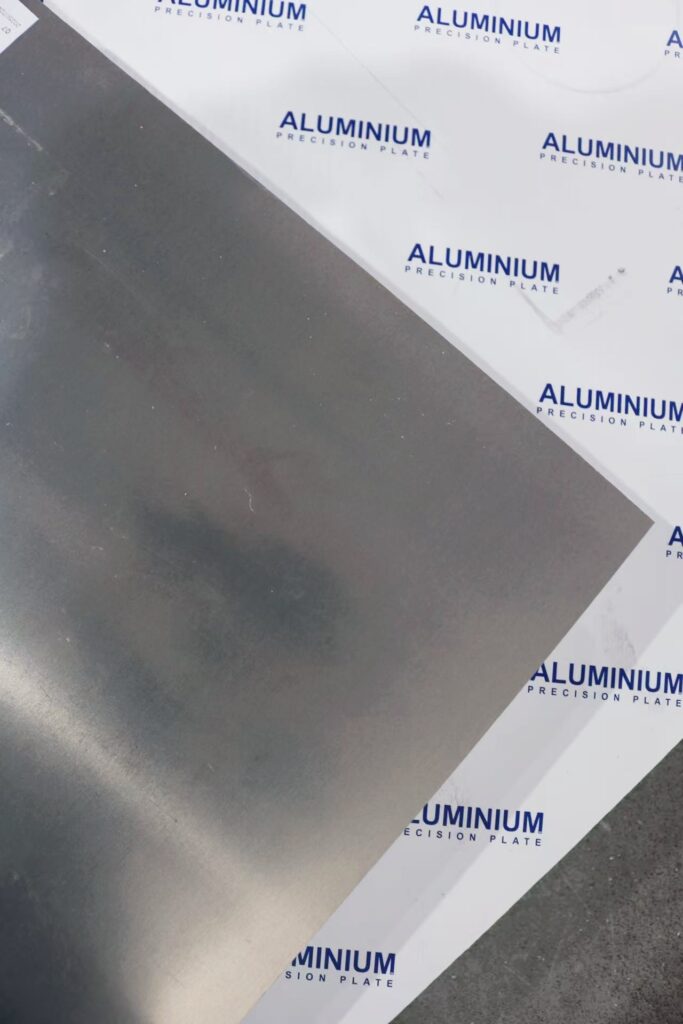 Aluminum precision plate on branded packaging