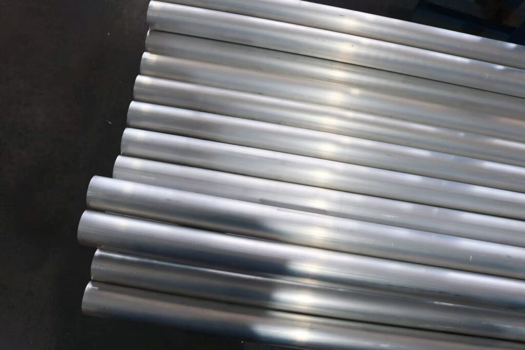Stack of shiny metal pipes