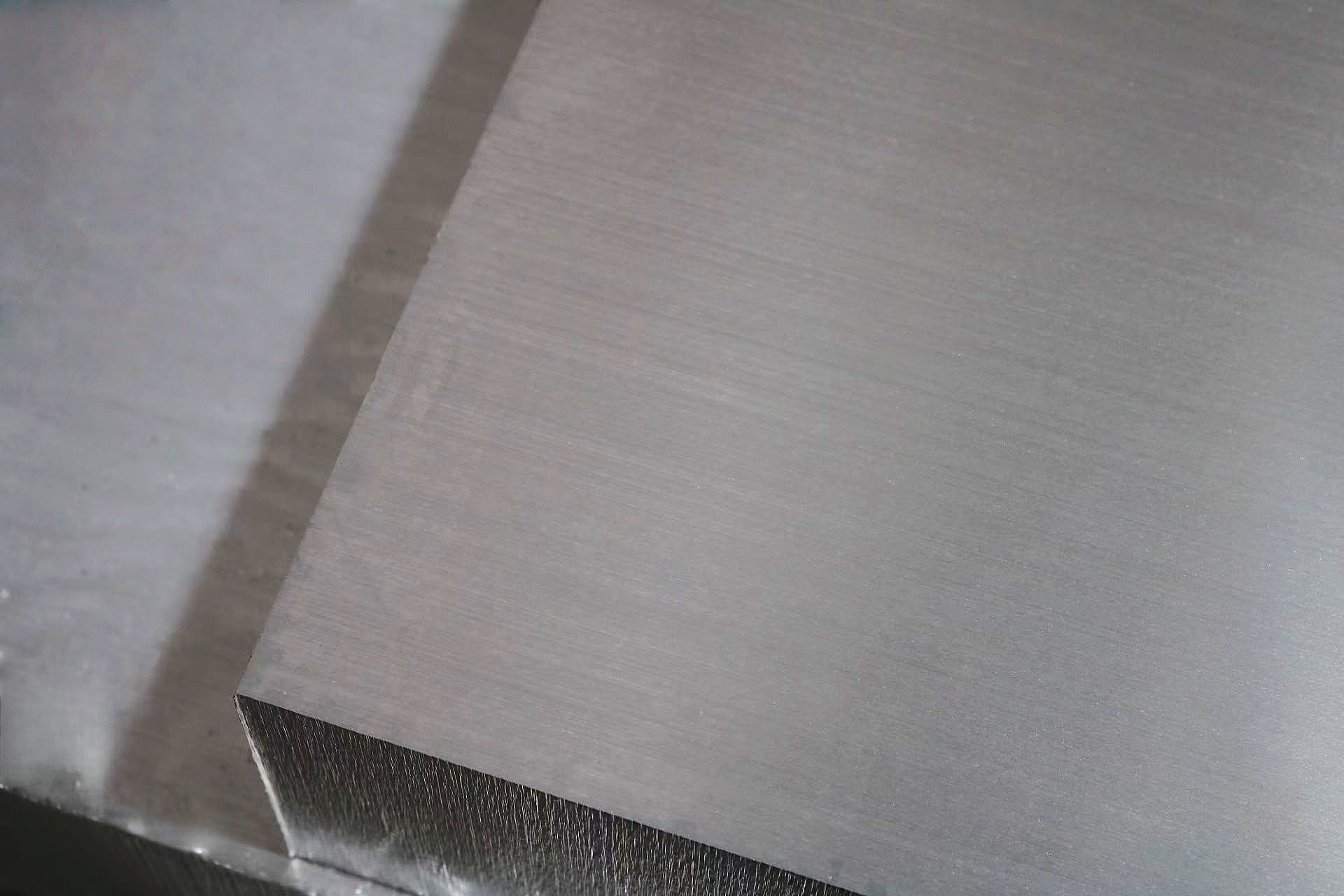 Close-up of flat metal slab surface
