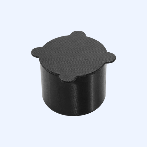 Black cylindrical plastic cap, perspective view