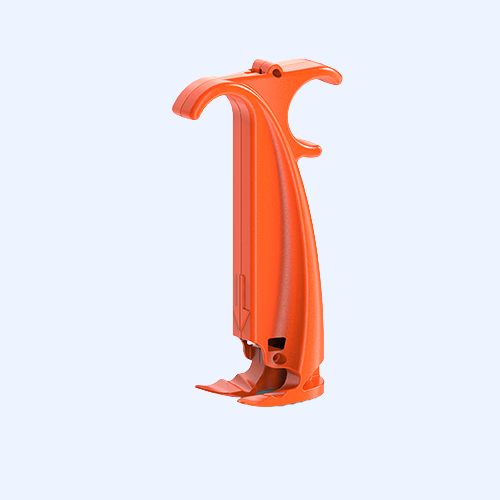 Orange plastic tool for cutting tape