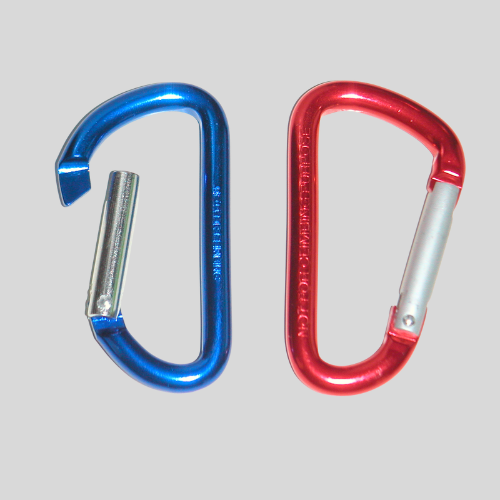 Blue and red carabiners on gray background.