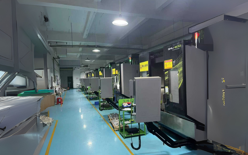 Modern CNC machines in a well-lit factory