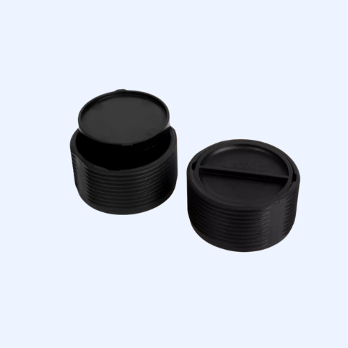 Two black plastic threaded caps