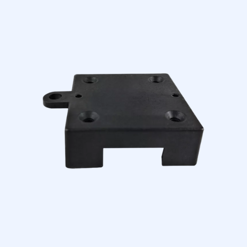 Black metal mounting plate with screw holes