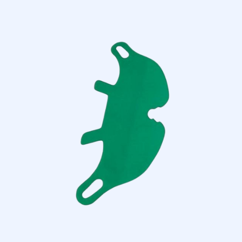 Green surgical mask on light background