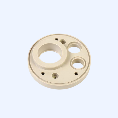 Circular beige mechanical component with multiple holes