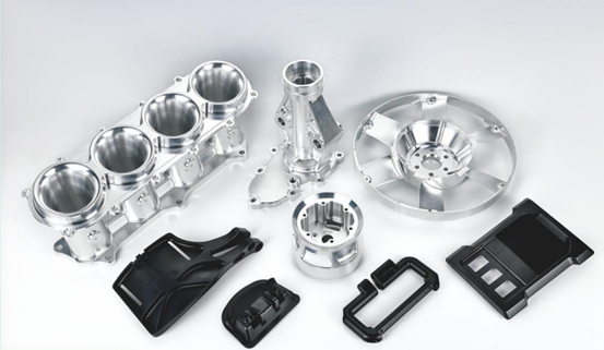 Various metal and plastic automotive parts displayed