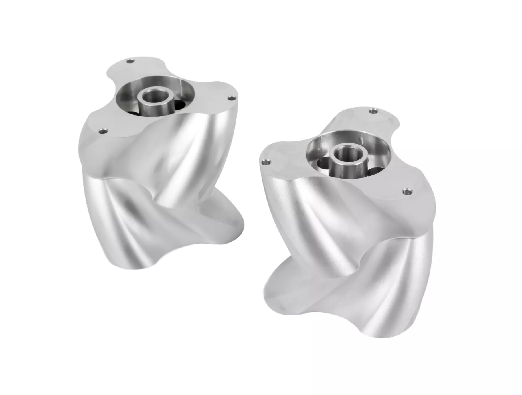 Two silver metallic sculpted parts